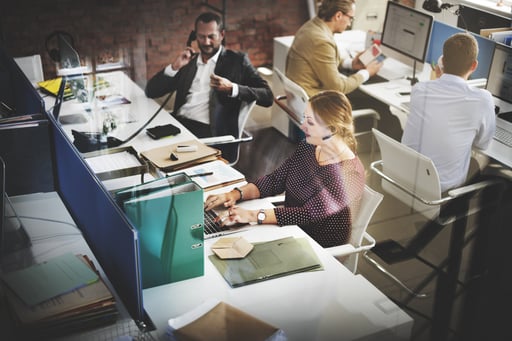 Customer service workers in a work office