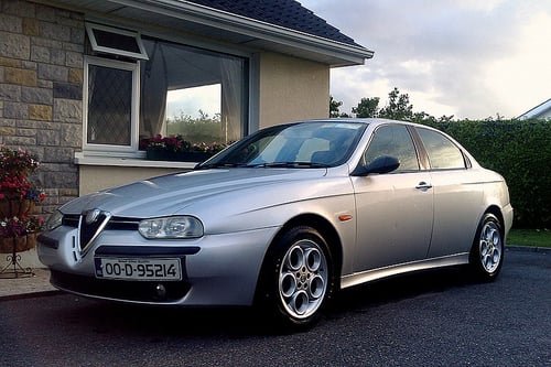 Alfa Romeo 156 car model in driveway